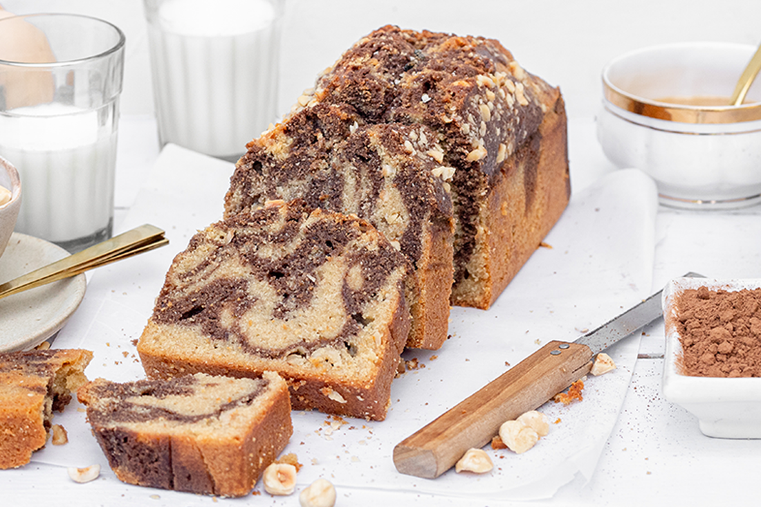 Experience the Best of Both Worlds: The Nutty and Chocolatey Delight of Café Swasthya's Hazelnut Chocolate Cake